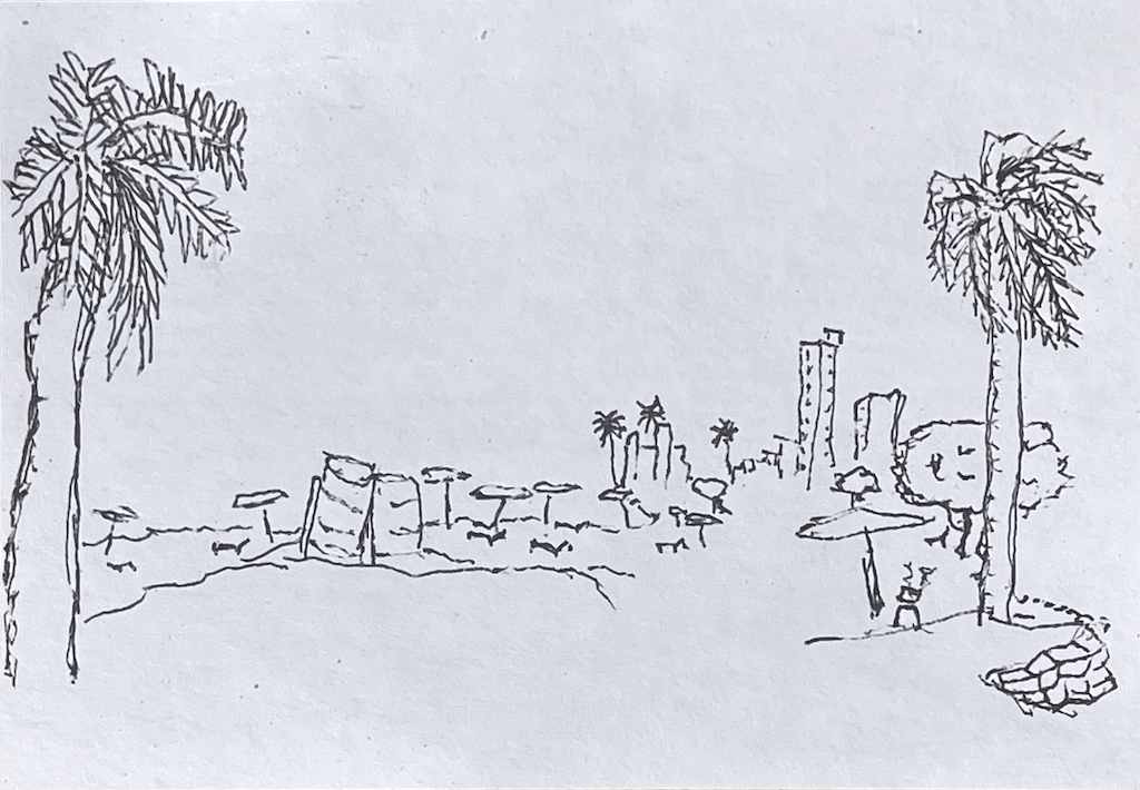 umbrellas line the beach as bbq happens