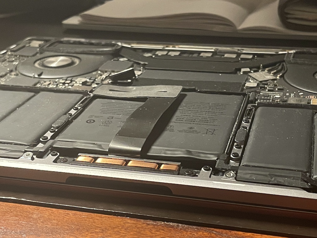 the uncovered underside of a macbook