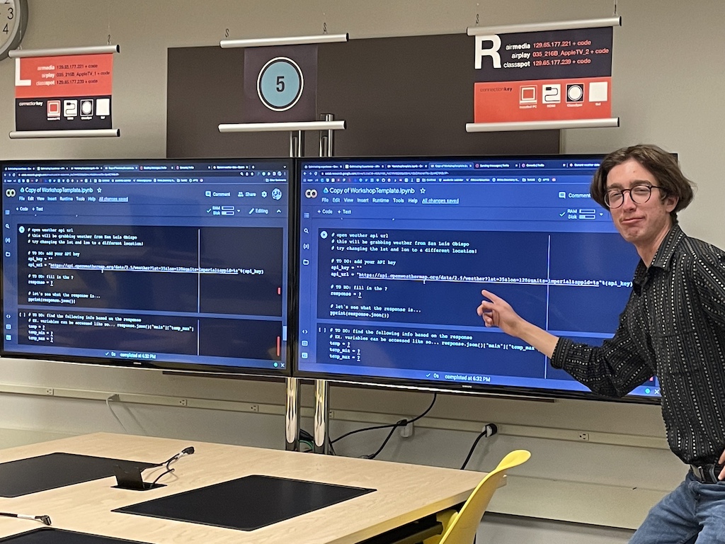 me pointing to a screen with code